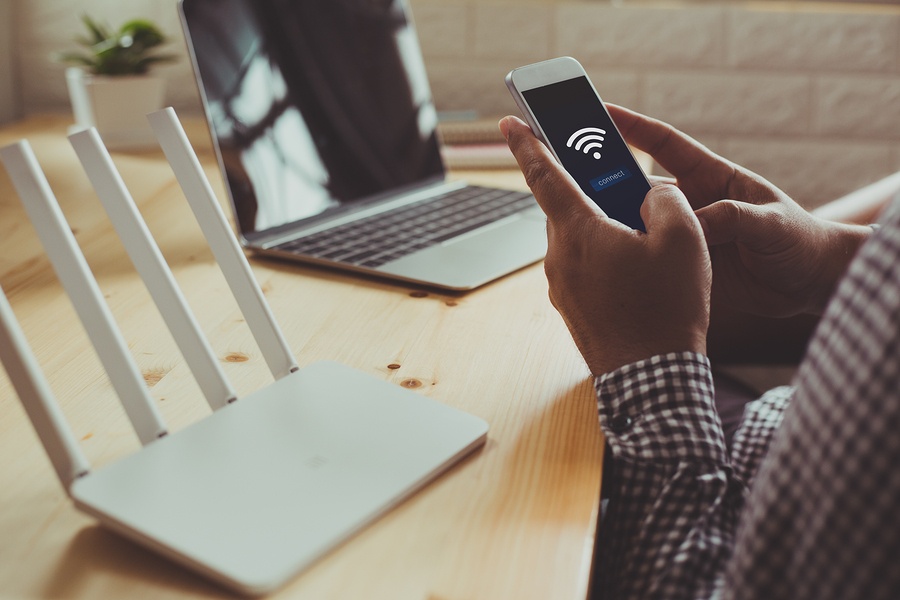 Residential managed WiFi - person on phone