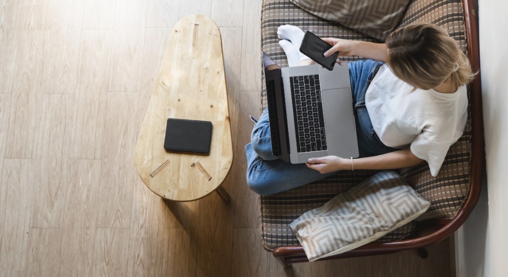 Smart home cybersecurity: Woman working from home on laptop